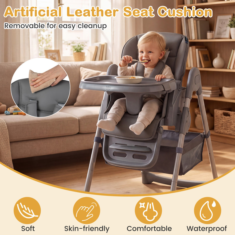 Foldable high chair for babies and toddlers in gray with adjustable features and removable waterproof artificial leather cushion.