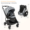 Foldable infant pram stroller in gray with a reversible seat, adjustable backrest, and compact design for easy storage.