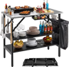 Foldable outdoor cook station includes a paper towel rack and spice rack for organized and convenient cooking while camping.
