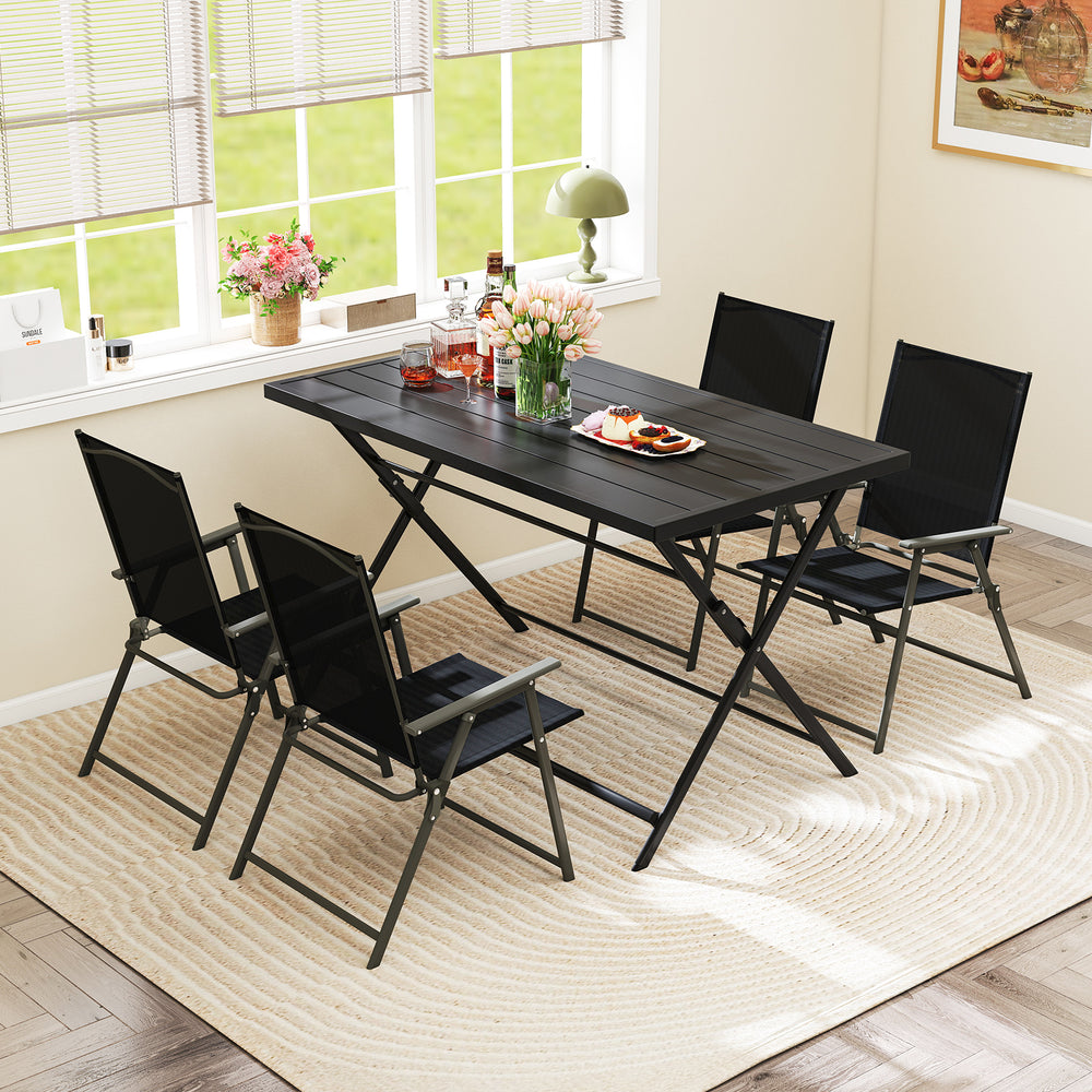 Foldable 48-inch black metal outdoor dining table with slatted tabletop and four chairs, perfect for patio gatherings.