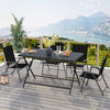 Foldable 48"x30" black metal patio dining table with slatted top, perfect for outdoor gatherings on the deck.
