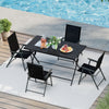 Foldable 48x30 inch black metal patio dining table with slatted tabletop, perfect for outdoor gatherings by the pool.