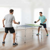 Foldable blue and green ping pong table set with adjustable height, perfect for indoor and outdoor play.