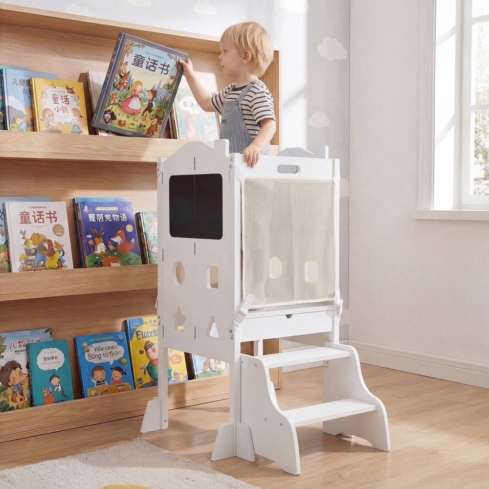 Foldable white toddler step stool with chalkboards, featuring a standing tower design for safe use and easy storage.