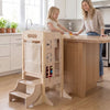 Foldable toddler step stool in wooden design, featuring a standing tower and 2-step stool for kitchen use.