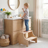 Wooden toddler step stool with two steps, designed for kids' independence and safety in the kitchen or bathroom.