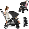 Foldable twin tandem stroller in black with adjustable handlebar, featuring sit and stand options for kids and ample.