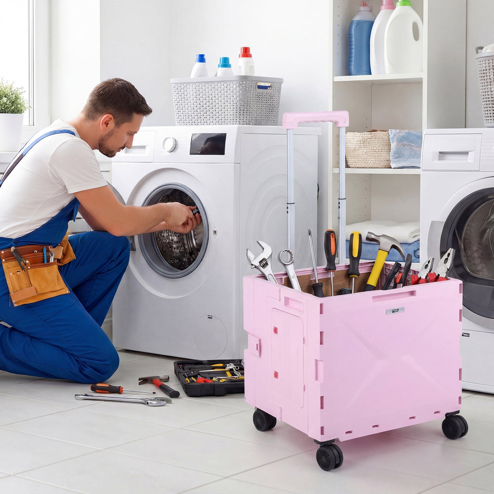 Foldable pink utility cart with tools, featuring adjustable handle and 4 wheels, ideal for home and outdoor use.