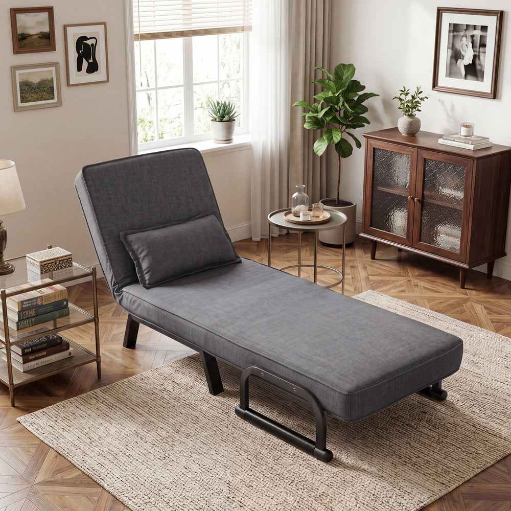 Gray folding 6-position convertible sleeper bed armchair with a soft pillow, ideal for versatile seating or sleeping.