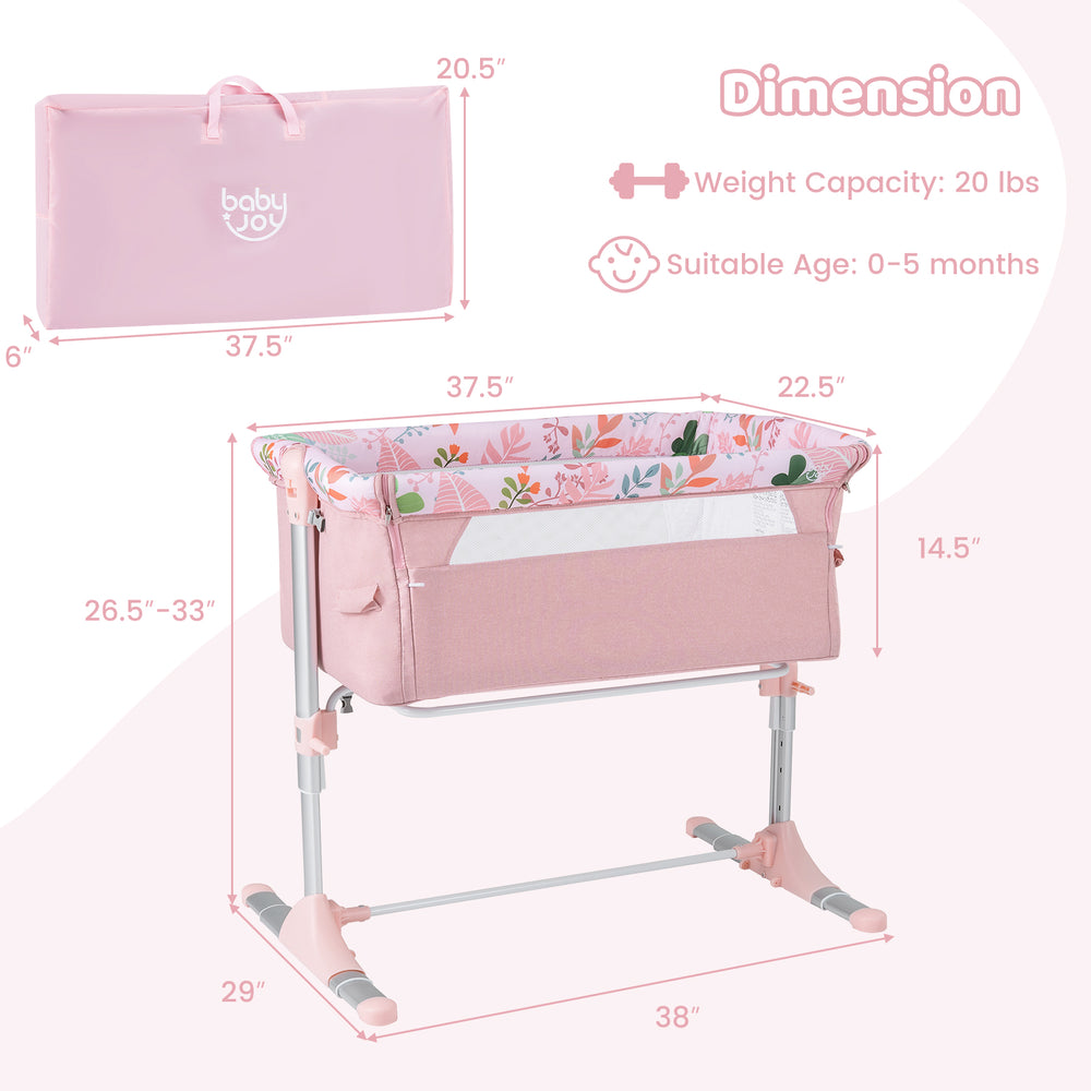 Folding baby bassinet bedside sleeper in pink with adjustable height, detachable side rail, and carry bag for easy.