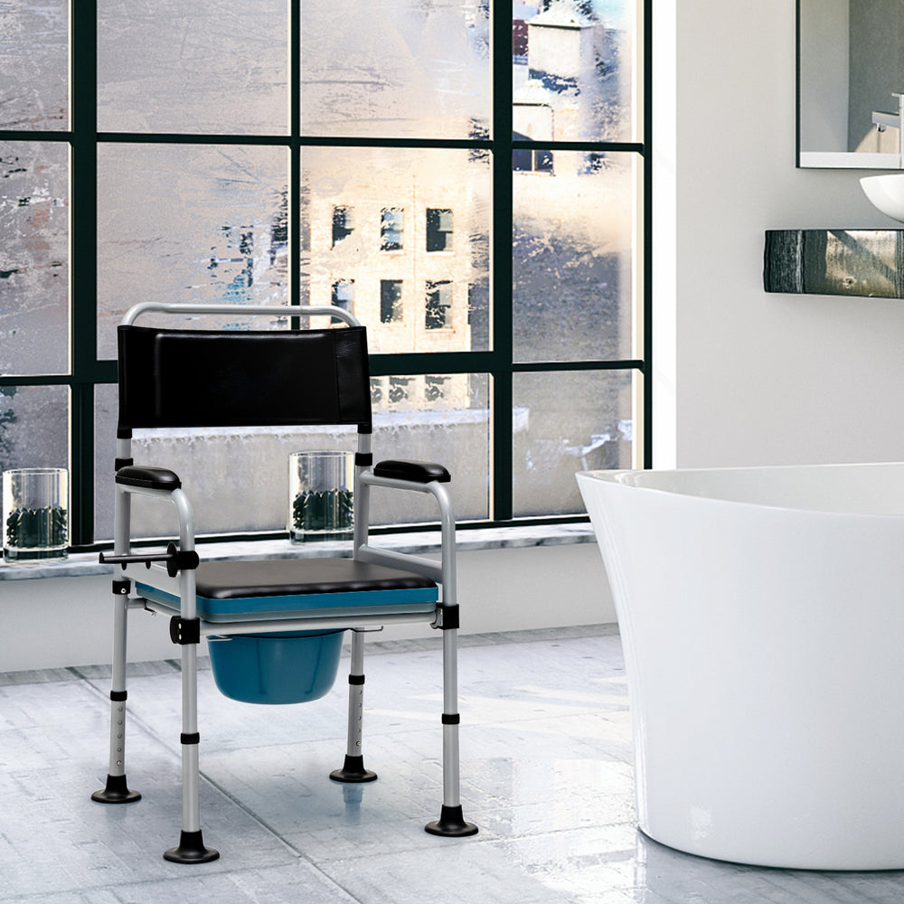 Folding bedside commode chair with detachable bucket and towel holder, featuring a robust carbonized steel frame and.