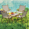 Set of two lightweight folding camp chairs in beige, perfect for beach or backyard use with ergonomic design and.