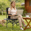 Folding camping chair with side table and cup holder, featuring breathable mesh back and portable design for outdoor.