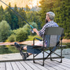 Folding camping director's chair in blue with cooler bag and side table, perfect for outdoor fishing trips.