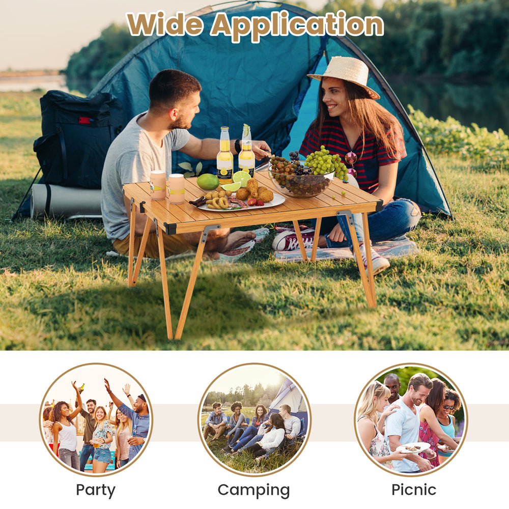 Folding camping table with waterproof surface, brown finish, perfect for picnics and camping activities.