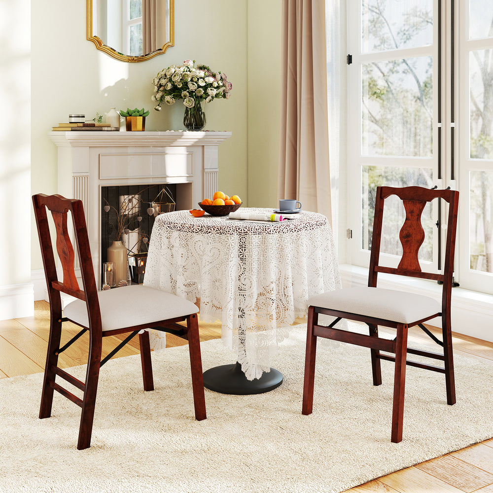 Set of 2 brown upholstered folding chairs with padded seats, ideal for dining and easy storage in any room.