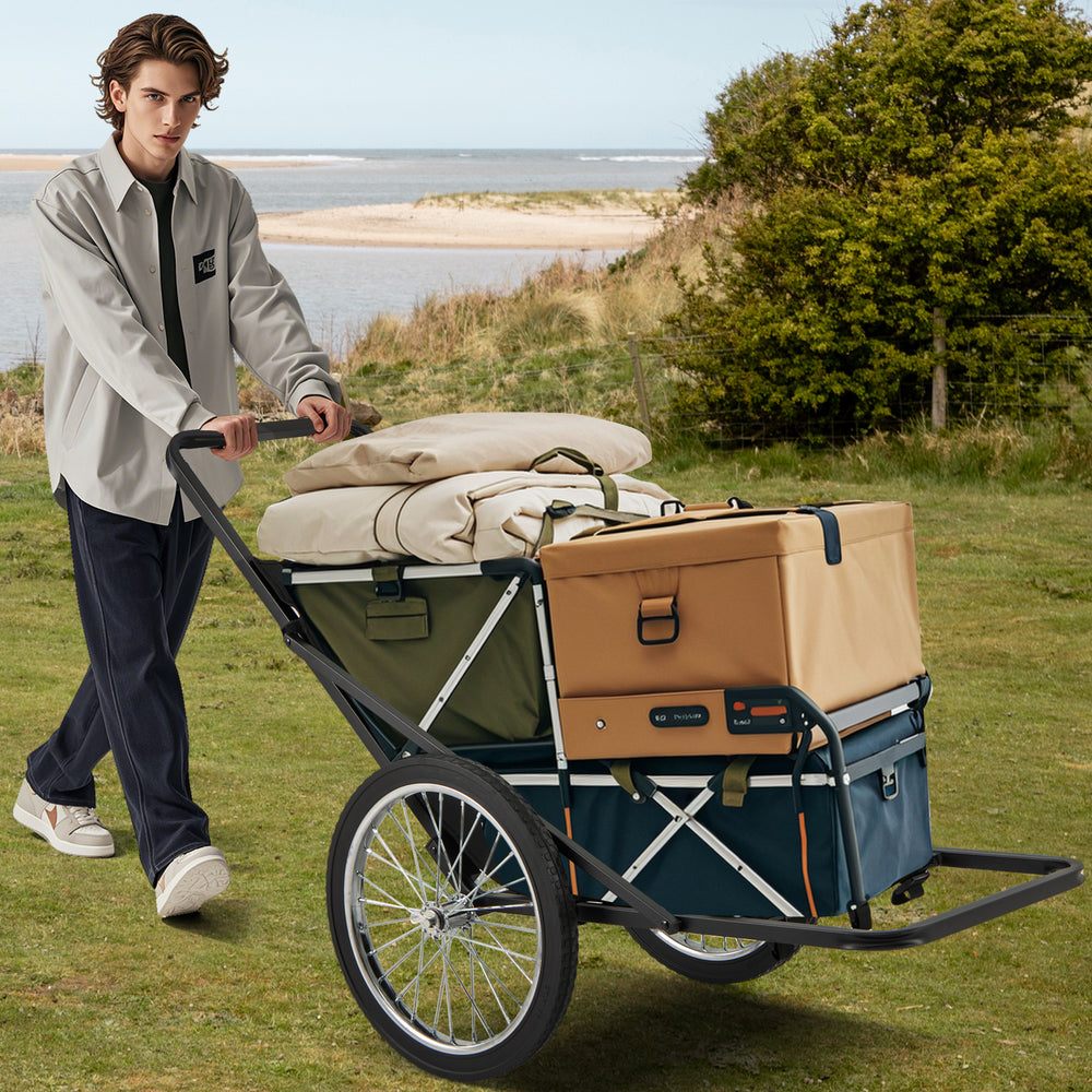 Folding deer game cart with robust metal frame, polyester liner, and rubber wheels for all-terrain hunting transport.