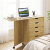 Folding desk in natural finish features 5 storage drawers and wheels for easy mobility, ideal for dorms and apartments.