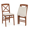 Single folding dining chair with padded seat and rubber wood frame, showcasing ergonomic X-shaped backrest for added.