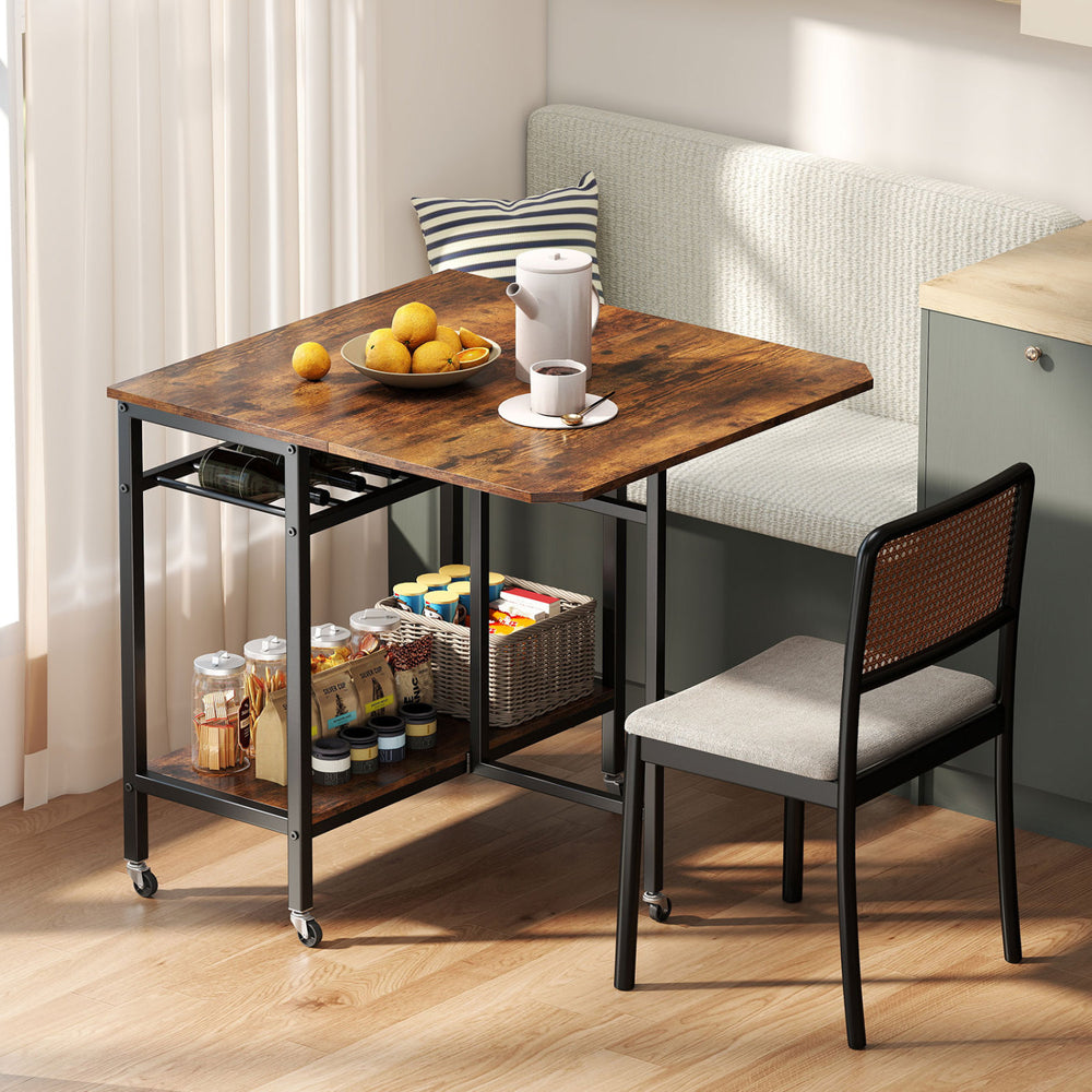 Folding dining table in rustic brown with expandable top, wine rack, and wheels, perfect for small spaces and versatile.