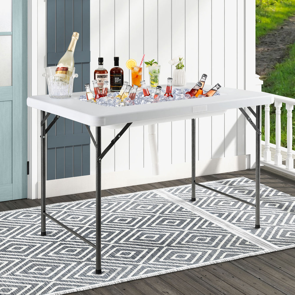 Folding ice bin table with skirt, spacious white HDPE top, perfect for camping, picnics, and weddings.