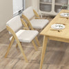 Set of 2 folding kitchen dining chairs with rubber wood legs in natural finish, featuring padded seats for comfort.