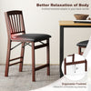 Counter height folding chair with padded seat and 100° inclined backrest for optimal comfort and relaxation.