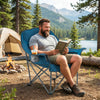 Oversized blue camping chair with side pockets and cup holder, perfect for outdoor relaxation and convenience.