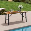 Folding picnic table made of acacia wood with a metal frame, perfect for outdoor dining by the poolside.