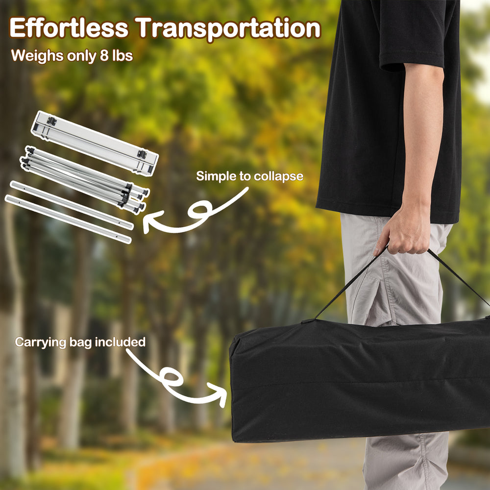 Folding roll-up camping table with metal legs, lightweight design, includes carrying bag for easy transportation.