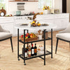 Folding round dining table featuring two drop leaf panels, lockable wheels, and metal mesh shelves for versatile use.