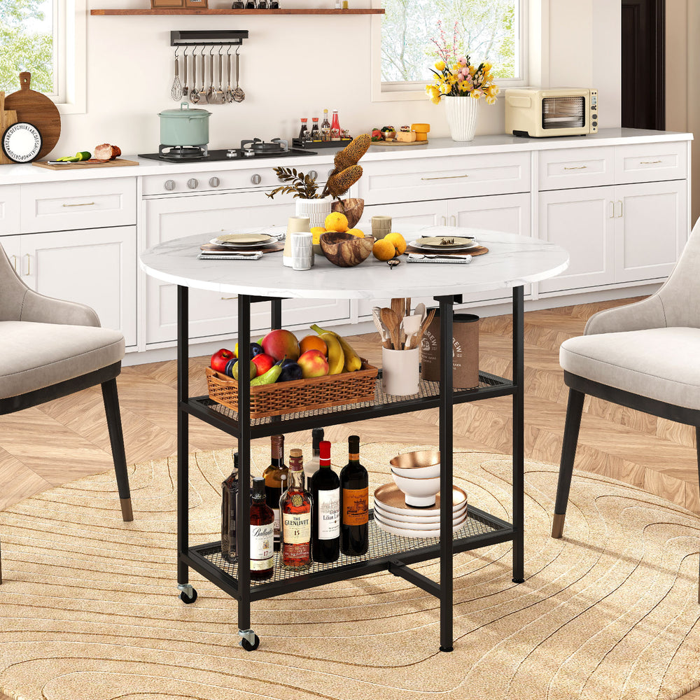 Folding round dining table featuring two drop leaf panels, lockable wheels, and metal mesh shelves for versatile use.