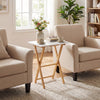 Folding TV tray table in white with bamboo legs, perfect for small spaces in living rooms or bedrooms.