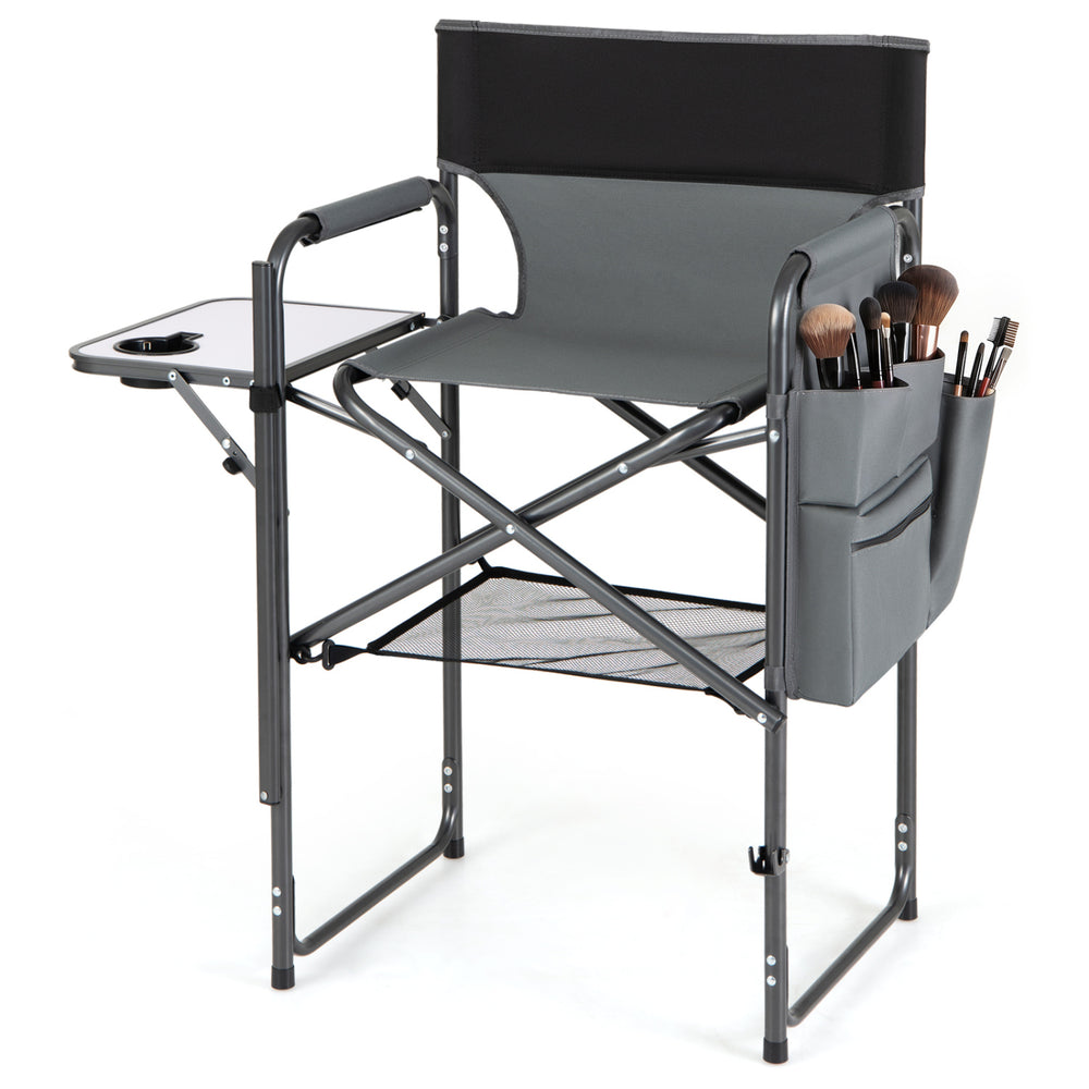 Folding tall director chair with 26-inch seat height, gray fabric, side table, and storage pockets for portable use.