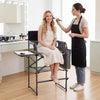 Folding tall director chair with a 26-inch seat height, gray fabric, and side table for portable comfort and support.