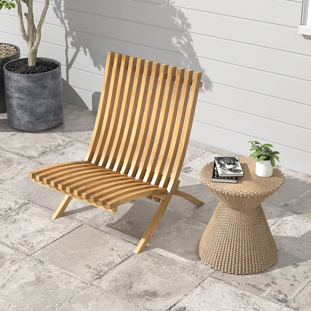 Folding teak wood outdoor lounge chair with slatted seat, perfect for patio relaxation and compact storage.