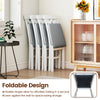 Stacked folding wooden dining chairs with faux leather upholstery, ideal for small spaces and easy storage.