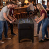 Foosball table with 22 players in action, featuring sturdy legs and adjustable foot pads for stable gameplay.