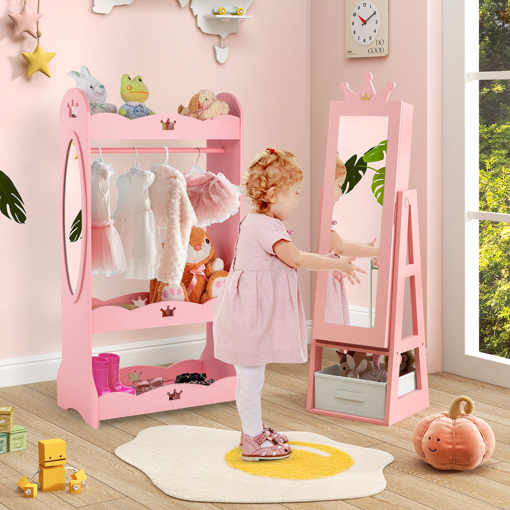 Free-standing pink kids jewelry armoire with full-length mirror, storage shelves, and stable triangular structure.