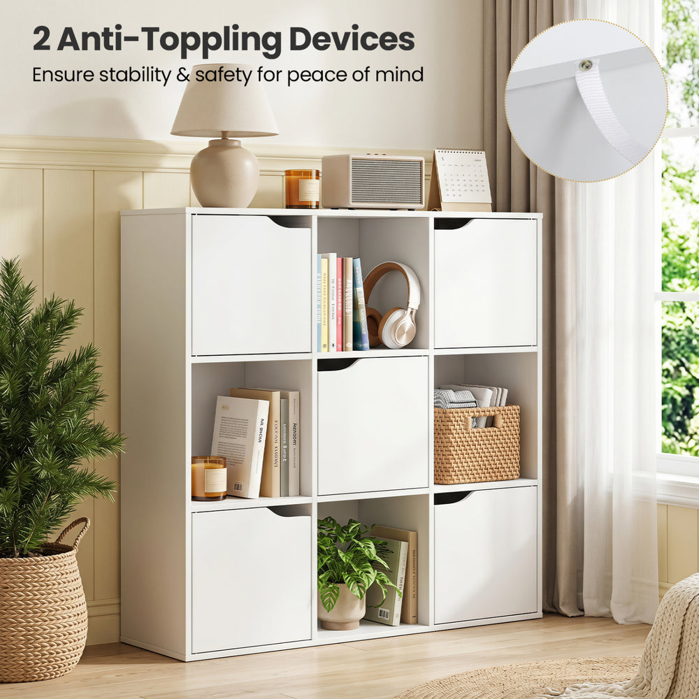 Free standing 9-cube storage bookcase in white features anti-tipping devices for stability and ample storage for home or office.
