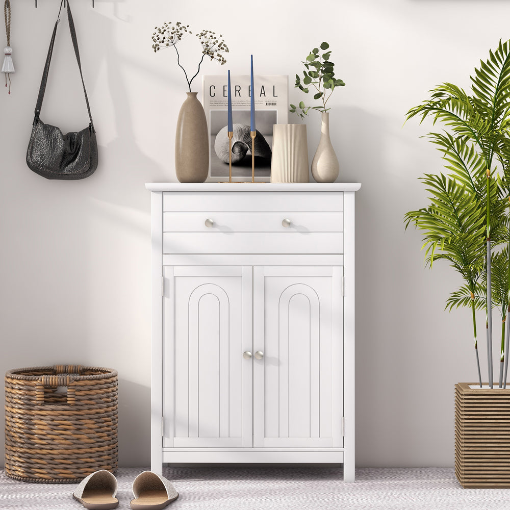 Free standing bathroom storage cabinet in white with large drawer and two doors, perfect for modern home organization.