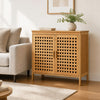 Bamboo bathroom storage cabinet with 2 doors, featuring hollowed-out doors and elevated legs for stylish organization.