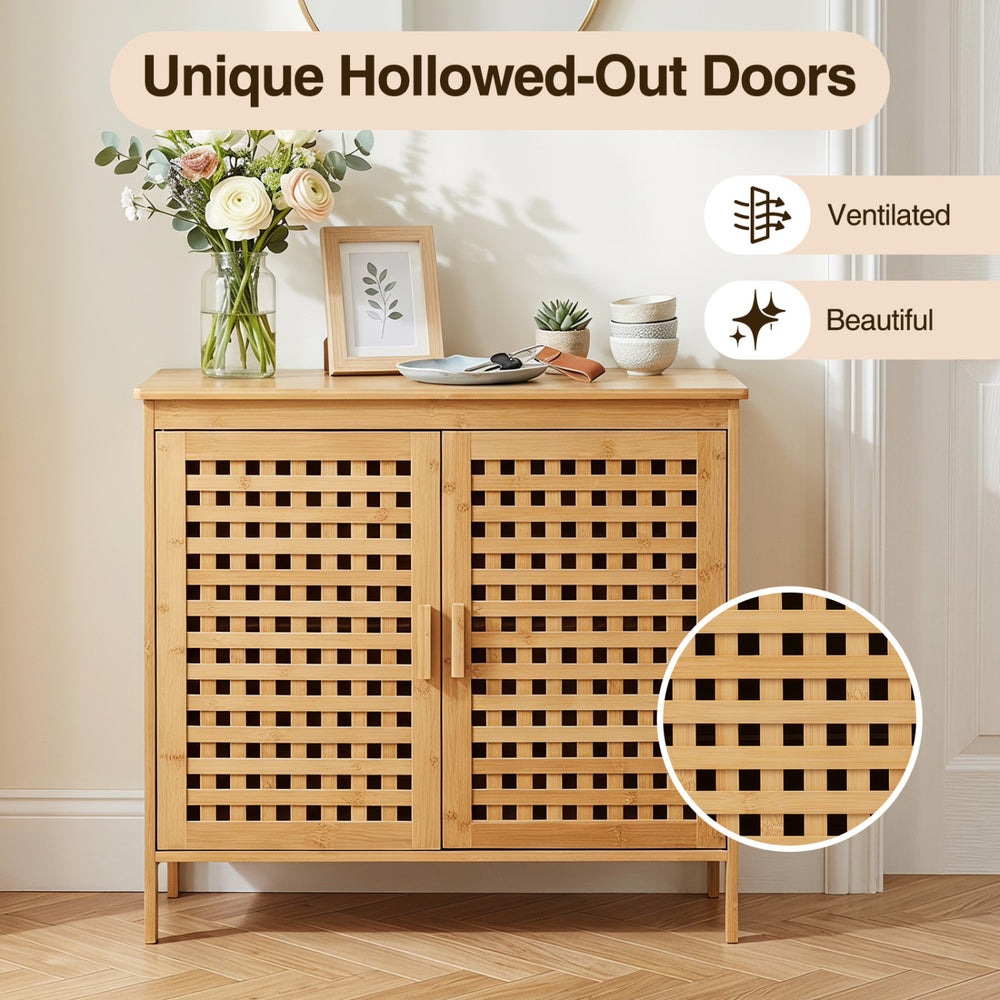 Bamboo bathroom storage cabinet with ventilated hollowed-out doors, sturdy construction, and elevated legs for added charm.