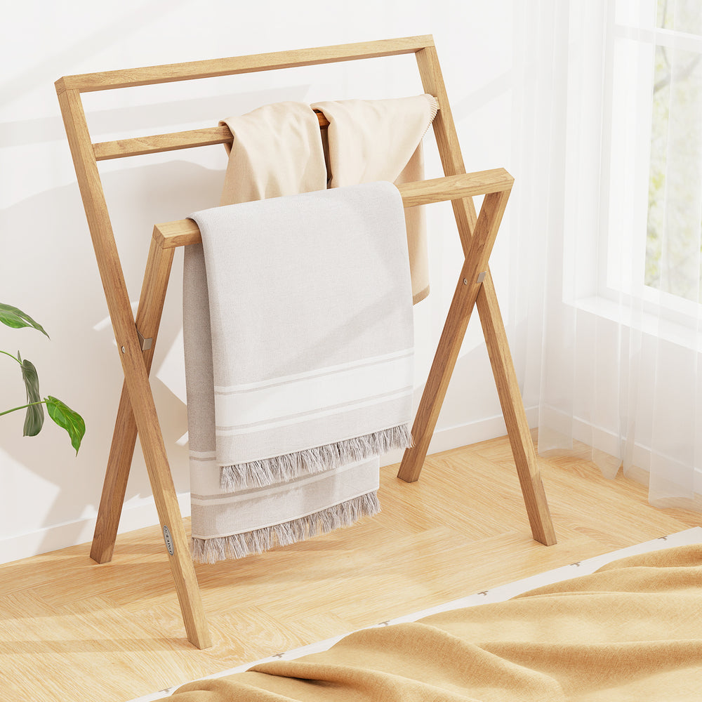 Freestanding foldable teak wood towel rack with three crossbars, ideal for drying towels in any room.