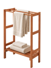 Freestanding towel rack in solid wood with three hanging bars and a bottom shelf for additional storage in the bathroom.