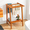 Freestanding towel rack made of Indonesian teak with storage shelf, ideal for towels and blankets in the bathroom.