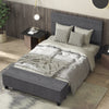 Full-size upholstered bed frame with ottoman storage, featuring a tufted headboard and modern design for stylish.