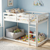 Full over full bunk bed in white solid pine wood with integrated ladder and safety guardrails for secure sleeping.