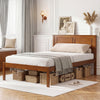 Farmhouse wooden platform bed frame with headboard in twin size, featuring storage baskets underneath for organization.