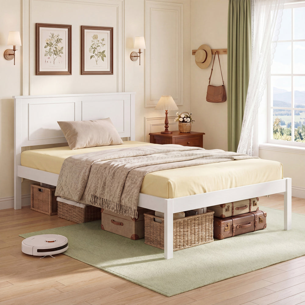 Twin size farmhouse wooden platform bed frame in white with headboard, styled in a cozy bedroom setting.